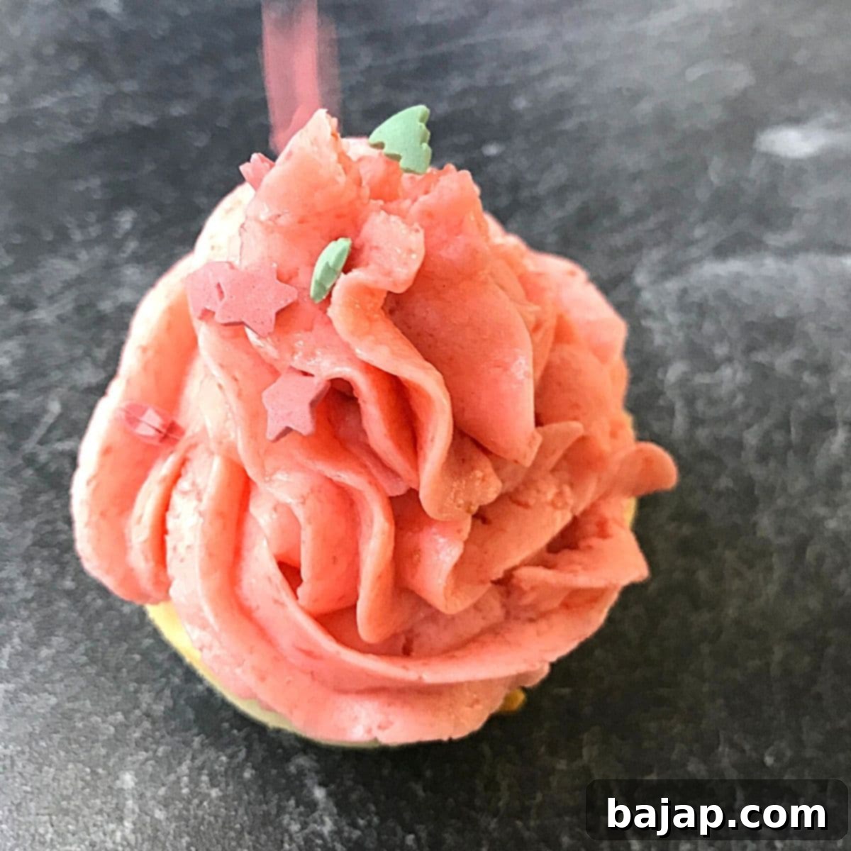 These fresh Strawberry Cupcakes with Ricotta are light and fluffy; the subtle ricotta sponge allows the strawberry flavor to develop and dominate its strawberry taste entirely.