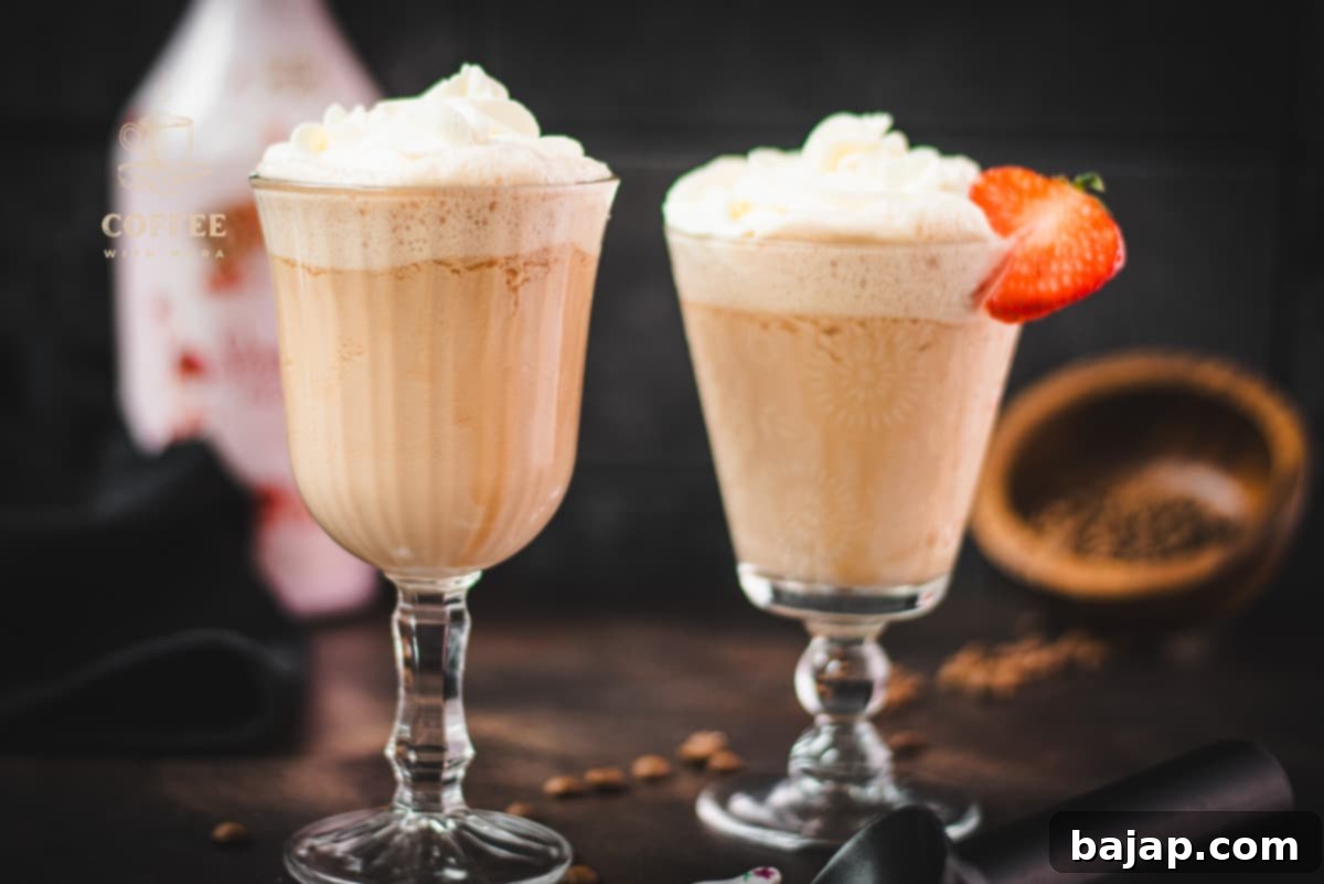 Sip & Savor: Strawberry Iced Coffee Delight, a creamy and refreshing coffee beverage blended with strawberry ice cream and a hint of Baileys.