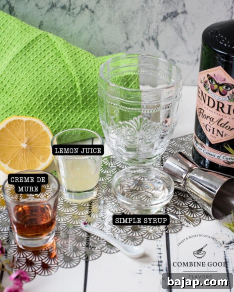 Bramble cocktail ingredients - creme de mure, lemon juice, gin, simple syrup, and crushed ice.