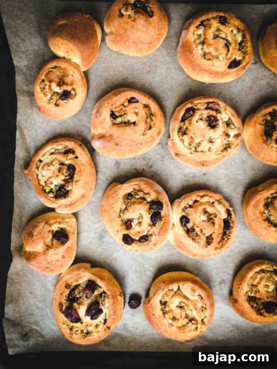 Mini pistachio sweet rolls after baking.