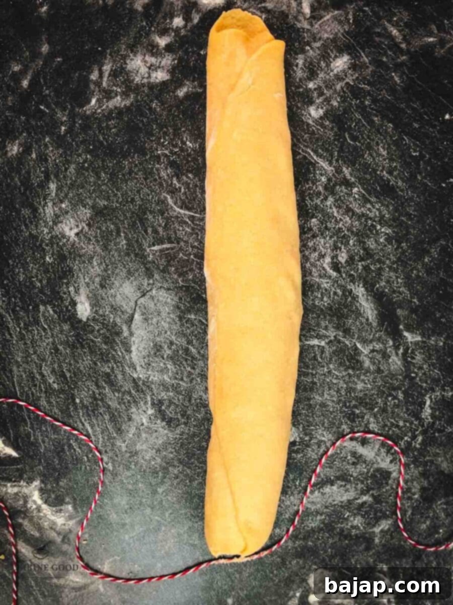 Cut the roll into finger thick slices, using a kitchen twine.