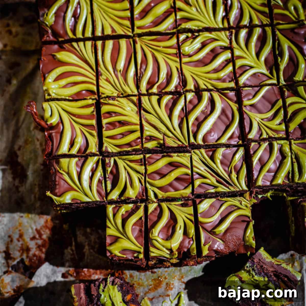 Rich fudgy chocolate pistachio brownies with pistachio cream and roasted pistachios.