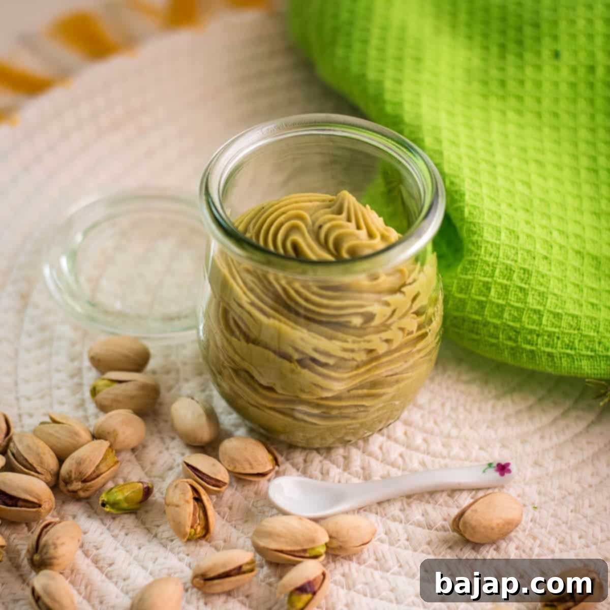 Preserving glass filled with scrumptious white chocolate pistachio ganache.