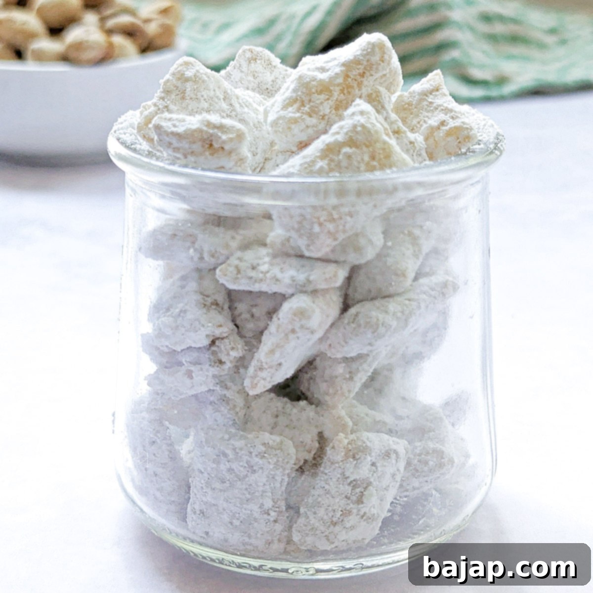 Sweet, crunchy pistachio puppy chow with crispy rice cereal and white chocolate.