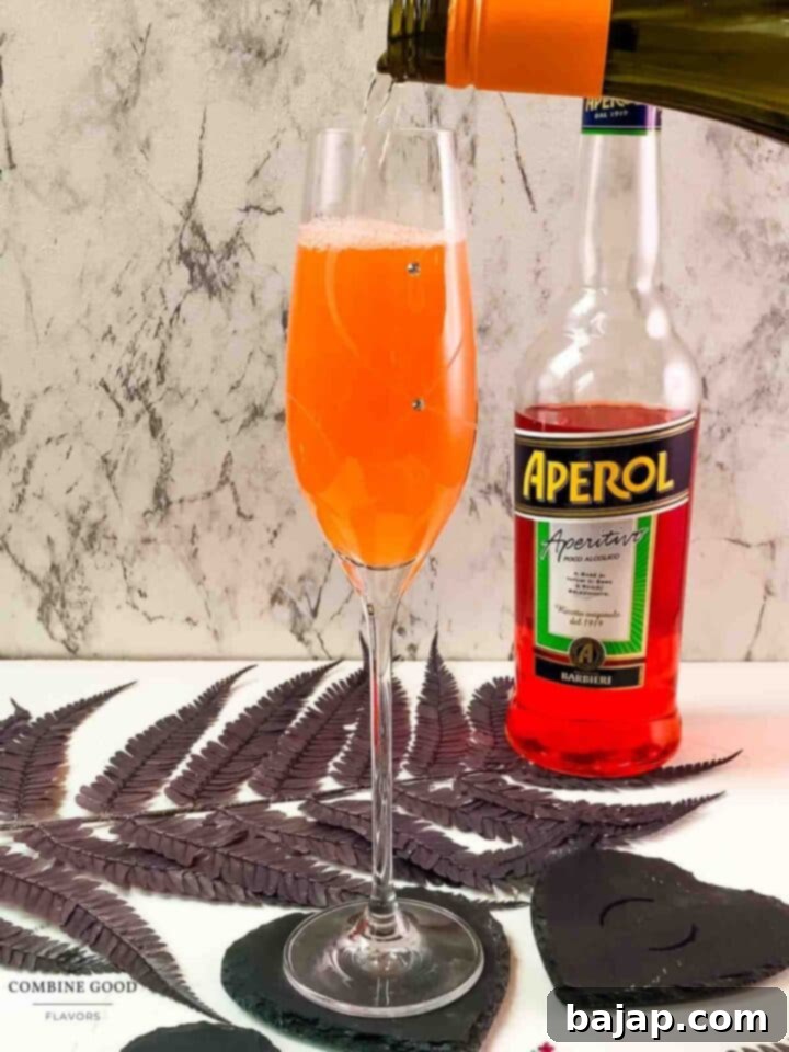 Top the Aperol and orange juice with Prosecco.
