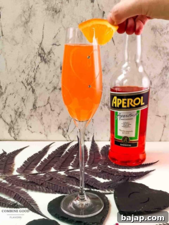 Garnish the Aperol mimosa, with a slice of orange.