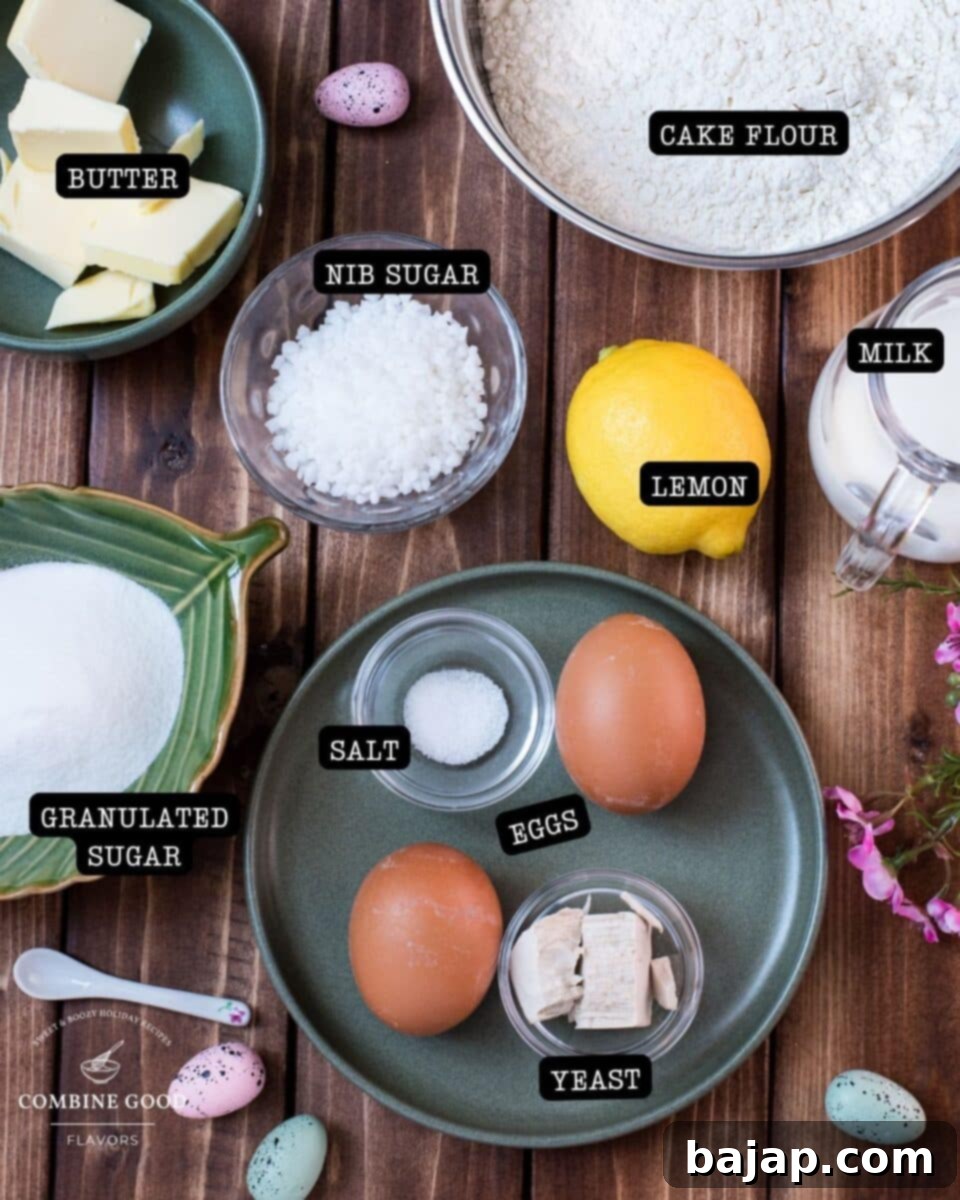 Ingredients for braided Easter bread wreath: butter, cake flour, nib sugar, lemon, milk, granulated sugar, salt, eggs, yeast displayed on a wooden surface.