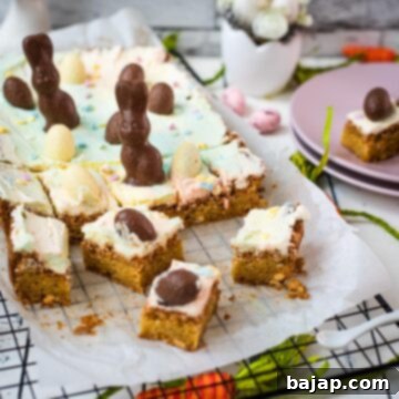 Sliced Funfetti Easter Sugar Cookie Bars with marbled frosting and festive decorations.