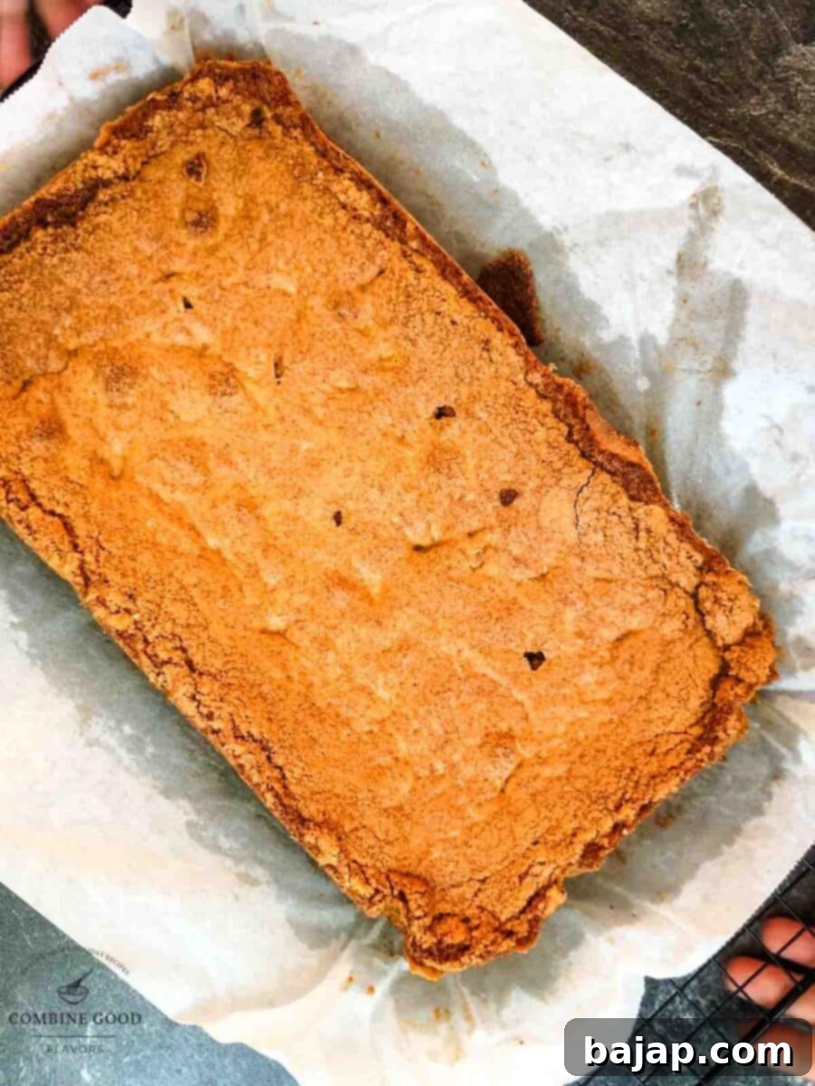 Ready baked cookie bars placed on cooling rack.