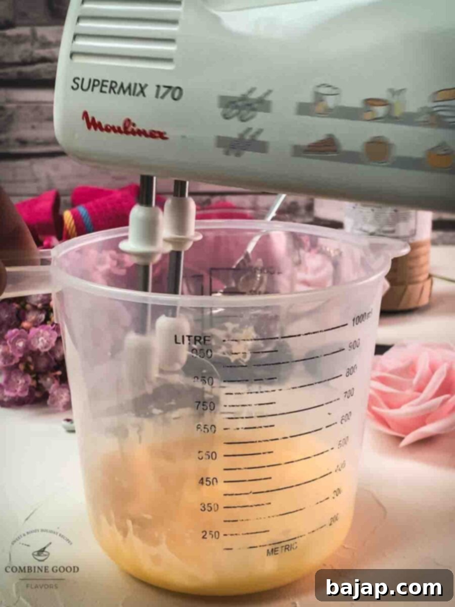 Whip up the Pour the egg yolk sugar Maraschino mixture.