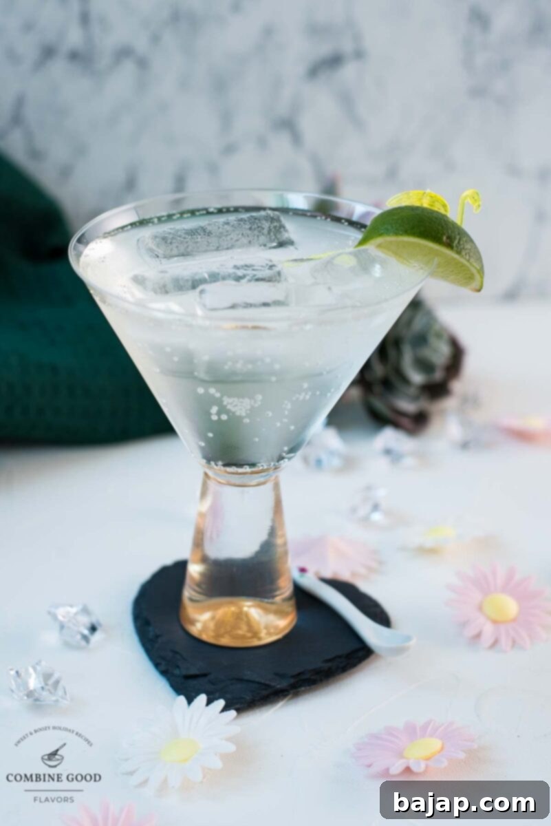 Easy and delicious! Vermouth tonic, in a gorgeous cocktail glass, placed on a black heartshaped slate coaster.