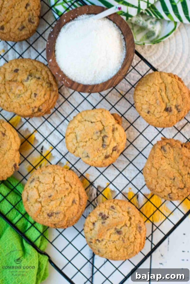 Delicious coconut chocolate chip cookies, on a cooling rack.