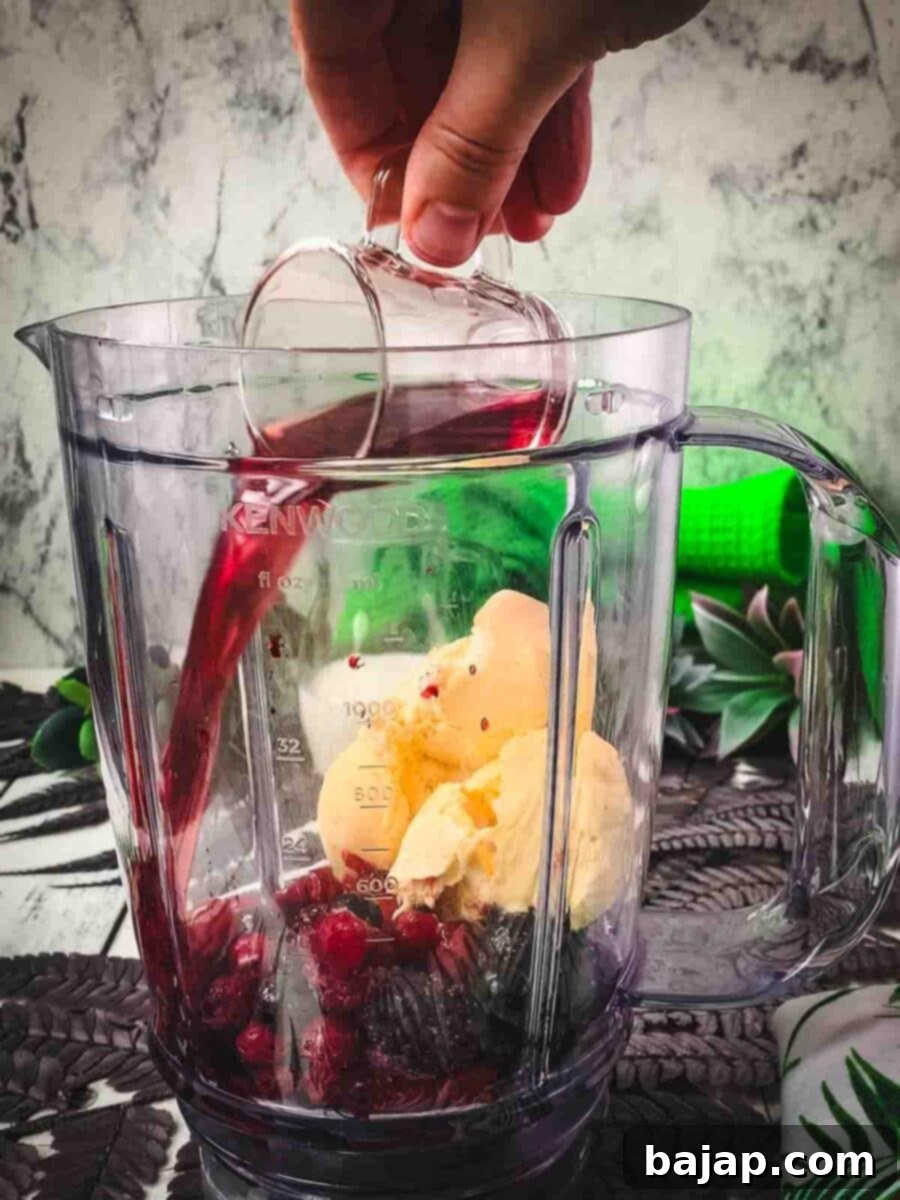 Add homemade Chambord to the blender.