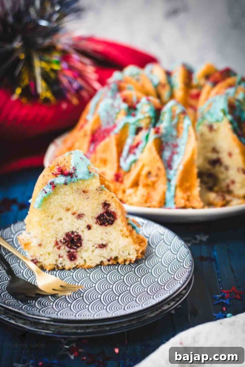 Slice of firecracker bundt cake. Placed on white blue plates.