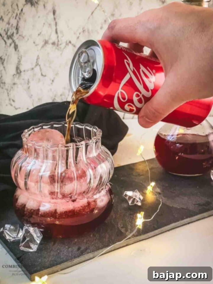 Top with Coke.
