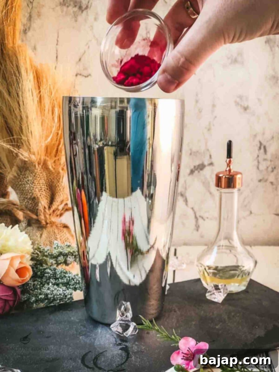 Add beetroot powder to the cocktail shaker.