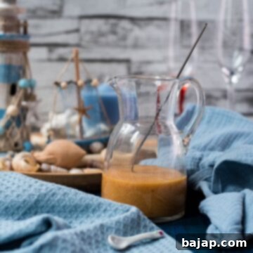 Golden Peach Purée: Perfect for Bellinis and Beyond 10 Bellini ready peach puree in a glass jug.