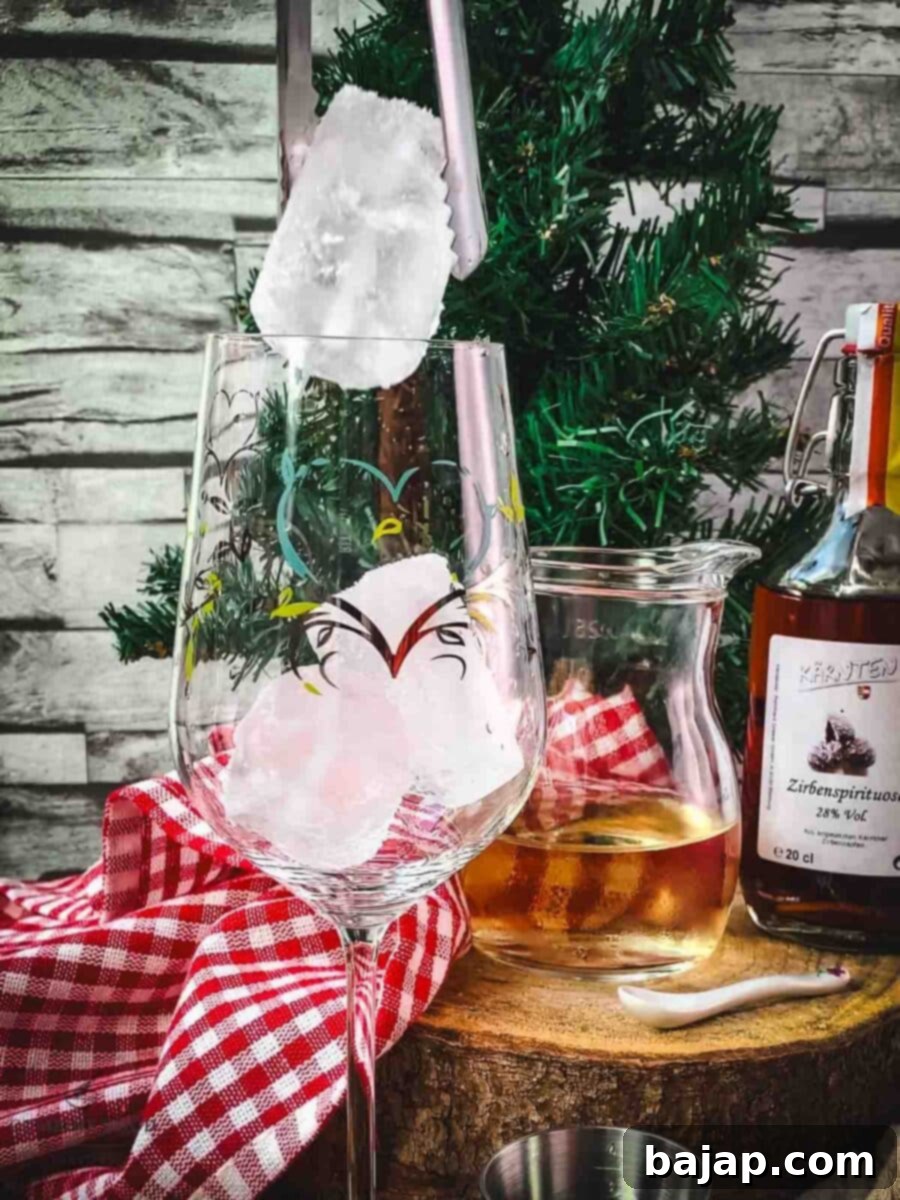 Add cubed ice to the glass for a perfectly chilled Zirben Spritzer.