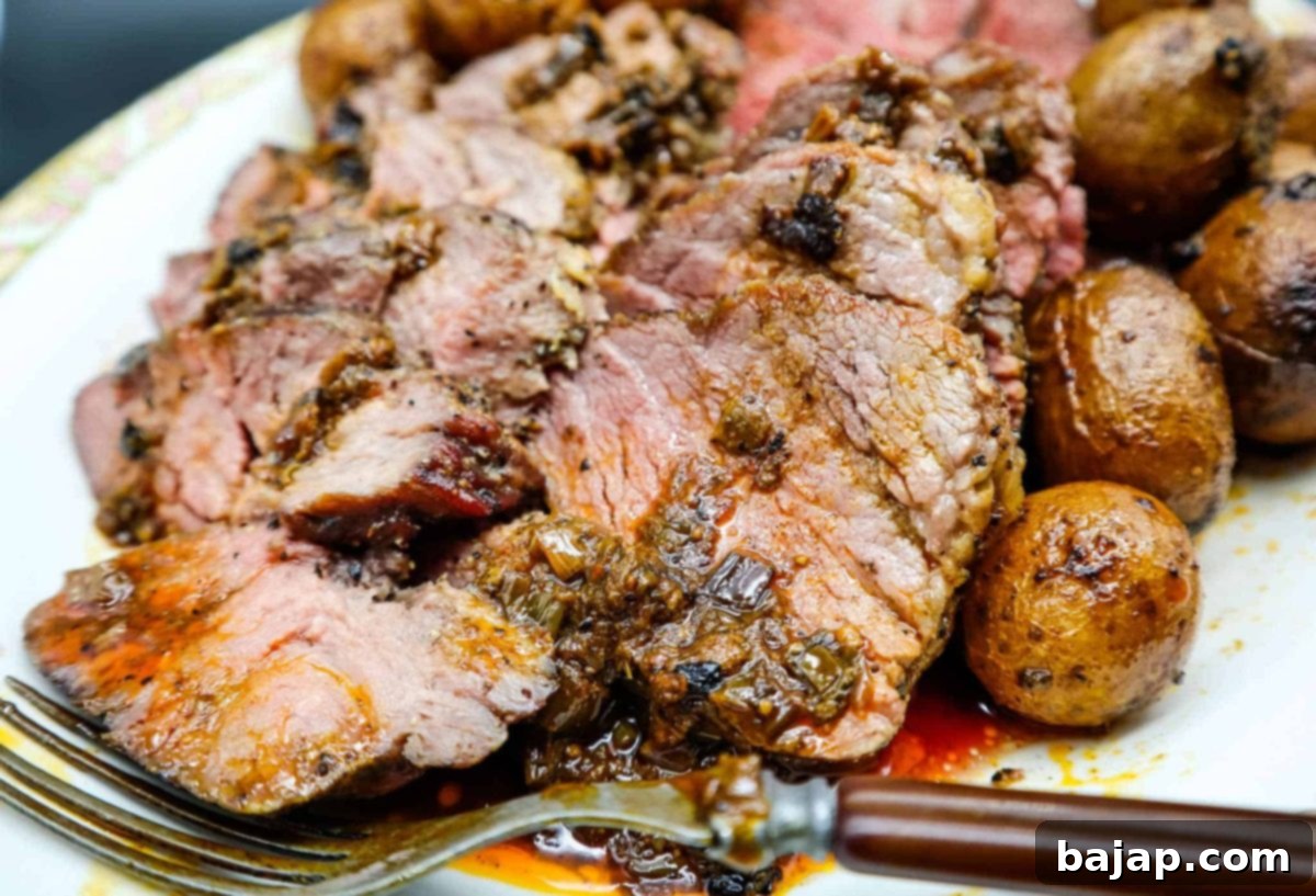 Christmas Dinner Beef Tenderloin Roast with garnishes