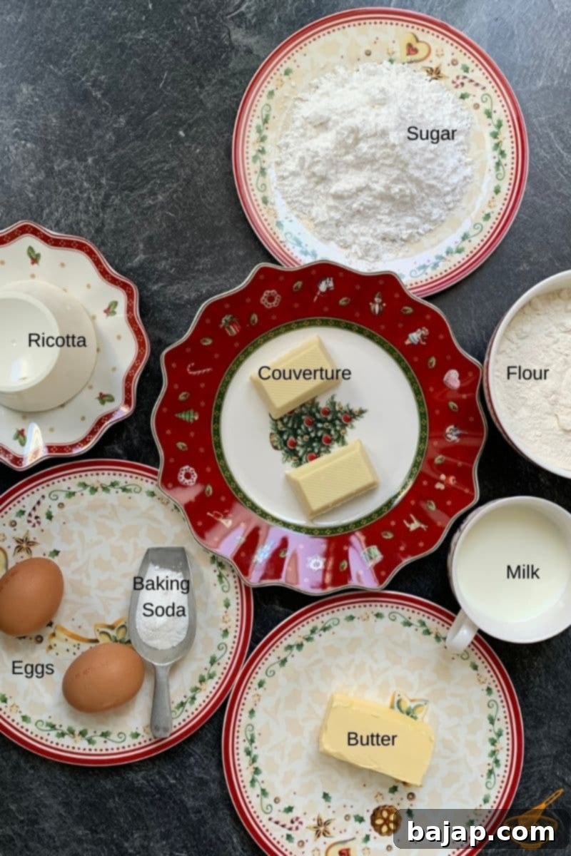 Ingredients for Ricotta Cupcake Sponge: ricotta cheese, all-purpose flour, powdered sugar, unsalted butter, whole milk, baking soda, eggs, white chocolate.