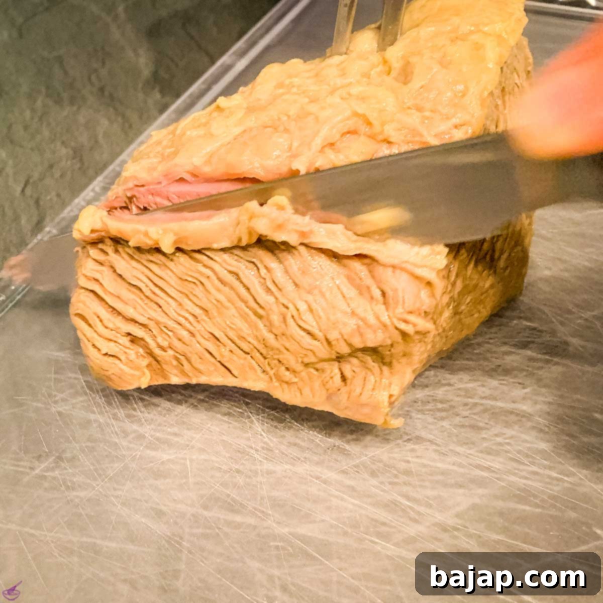 Fully cooked Tafelspitz (prime boiled beef) after 2.5 hours. Cut into finger-thick slices.