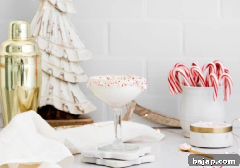 Refreshing Peppermint Martini with candy cane garnish