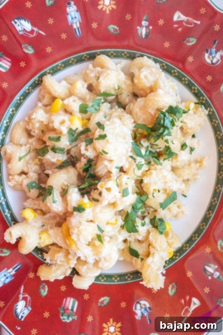 Sprinkle your Mac and Cheese with the chopped parsley and enjoy! Yum!