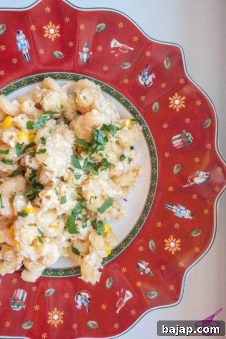 Sprinkle your Mac and Cheese with the chopped parsley and enjoy! Yum!