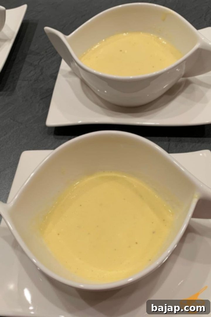 Gluten-Free Sweet Corn Soup 2 ready to eat gluten-free sweet corn soup, garnished with fresh herbs