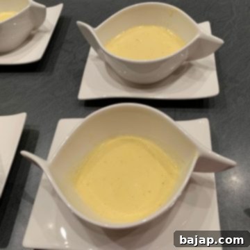 Gluten-Free Sweet Corn Soup 6 ready to eat gluten-free sweet corn soup, garnished with fresh herbs