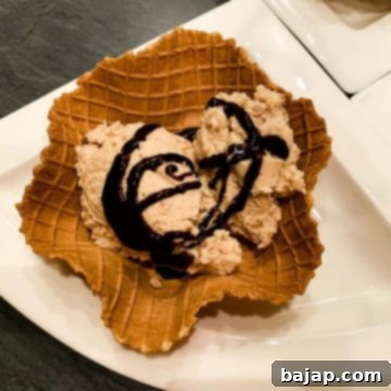 Waffle filled with homemade chestnut puree! Garnished with chocolate sauce!