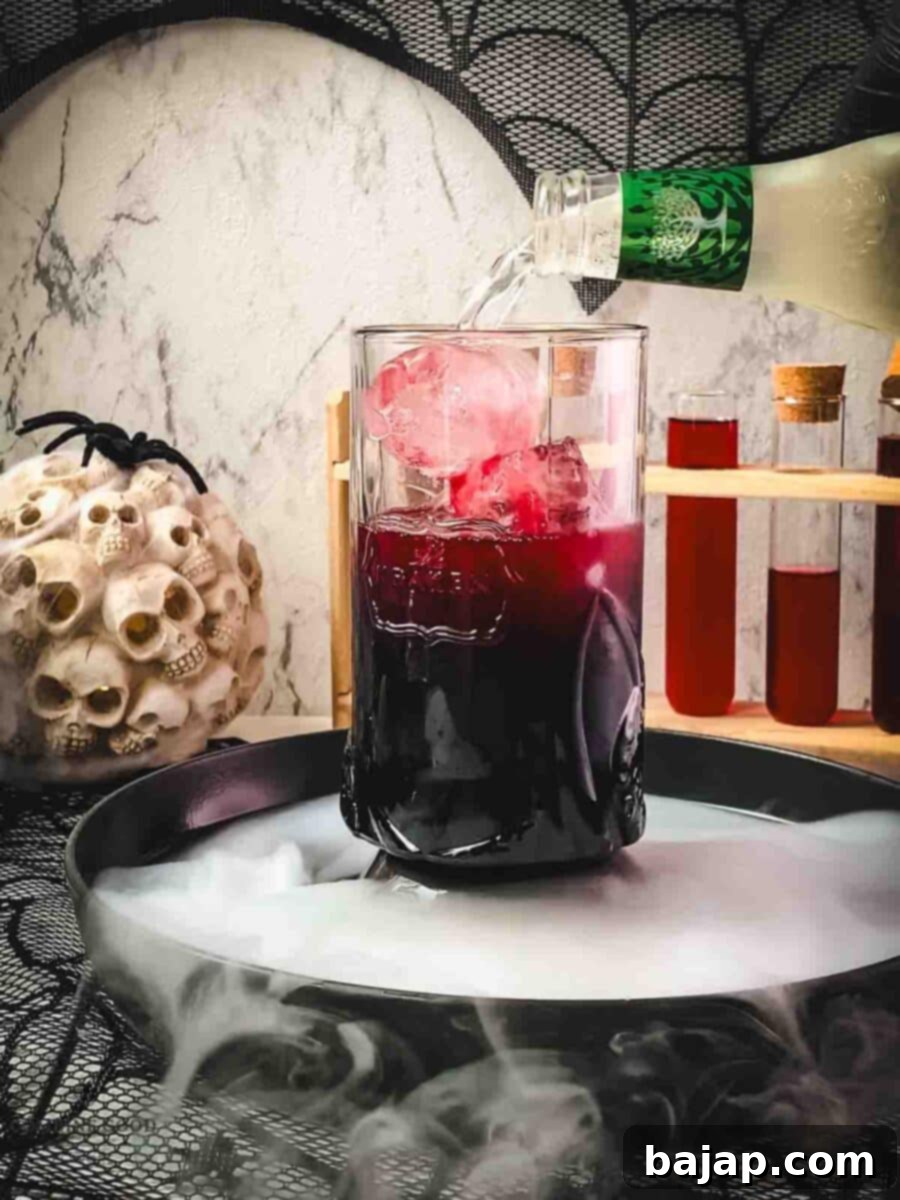 Top with ginger beer.