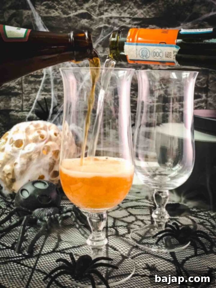 Pour Guiness and sparkling wine simultaneously into the serving glass for a layered effect.