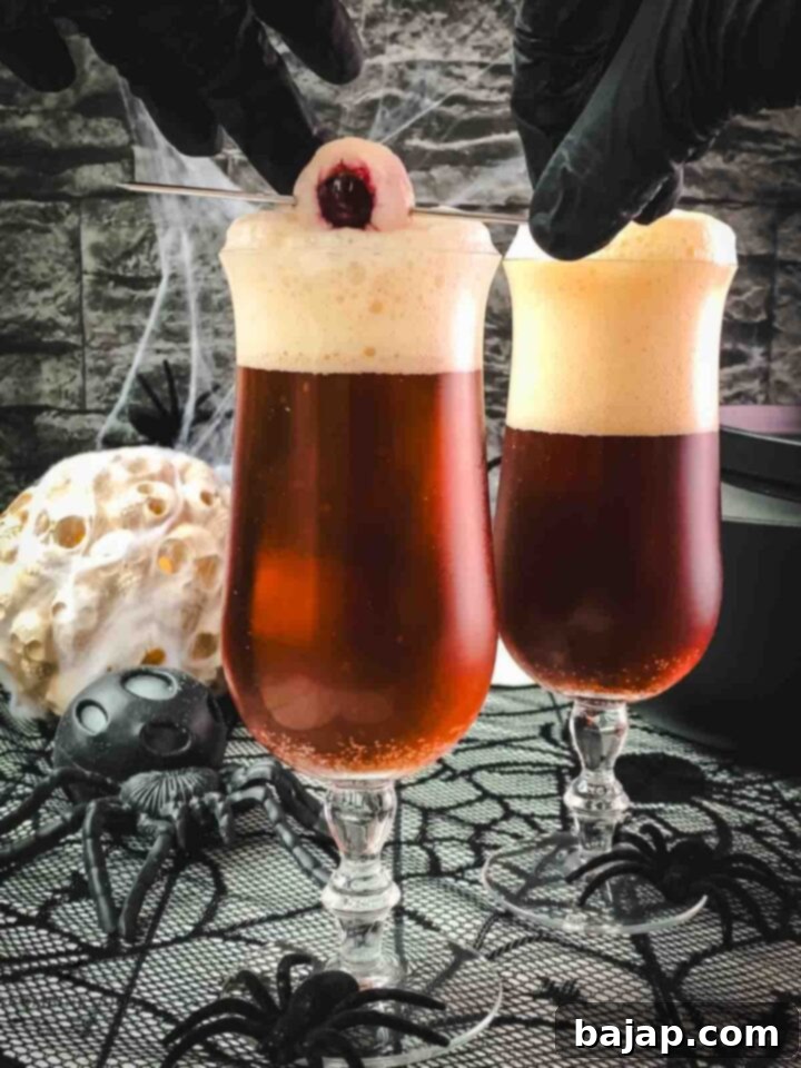 Garnish your black velvet cocktail with a spooky lychee eyeball, complete with a frozen blueberry pupil.