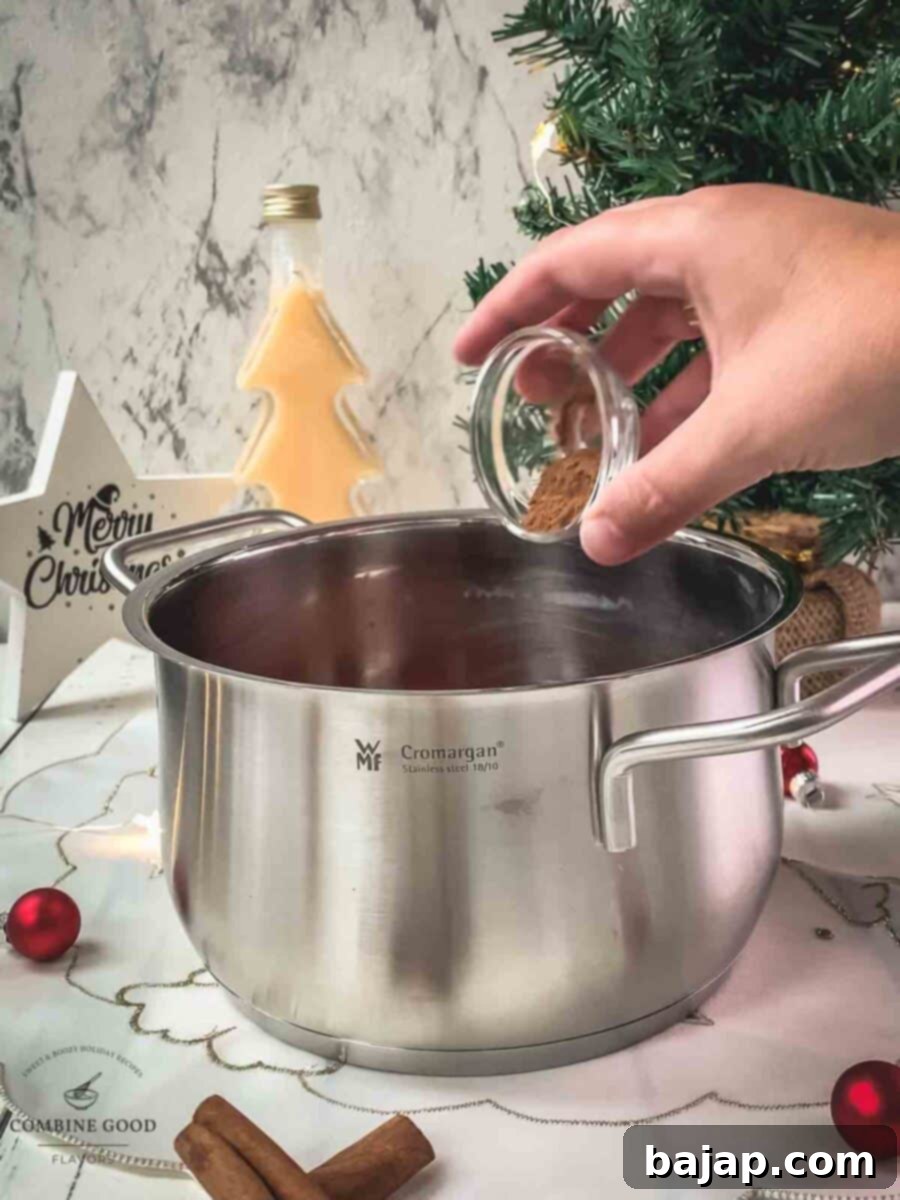 Add ground cinnamon to the saucepan.