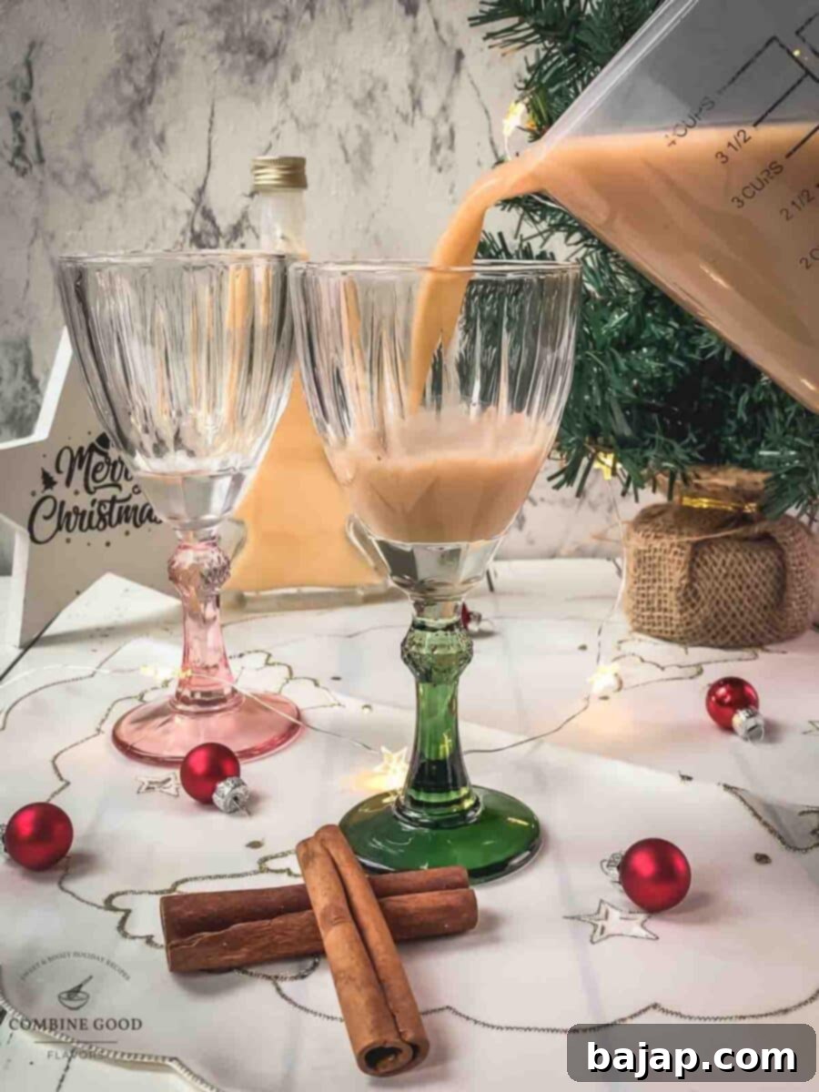 Divide the spiced apple cider between the serving glasses.