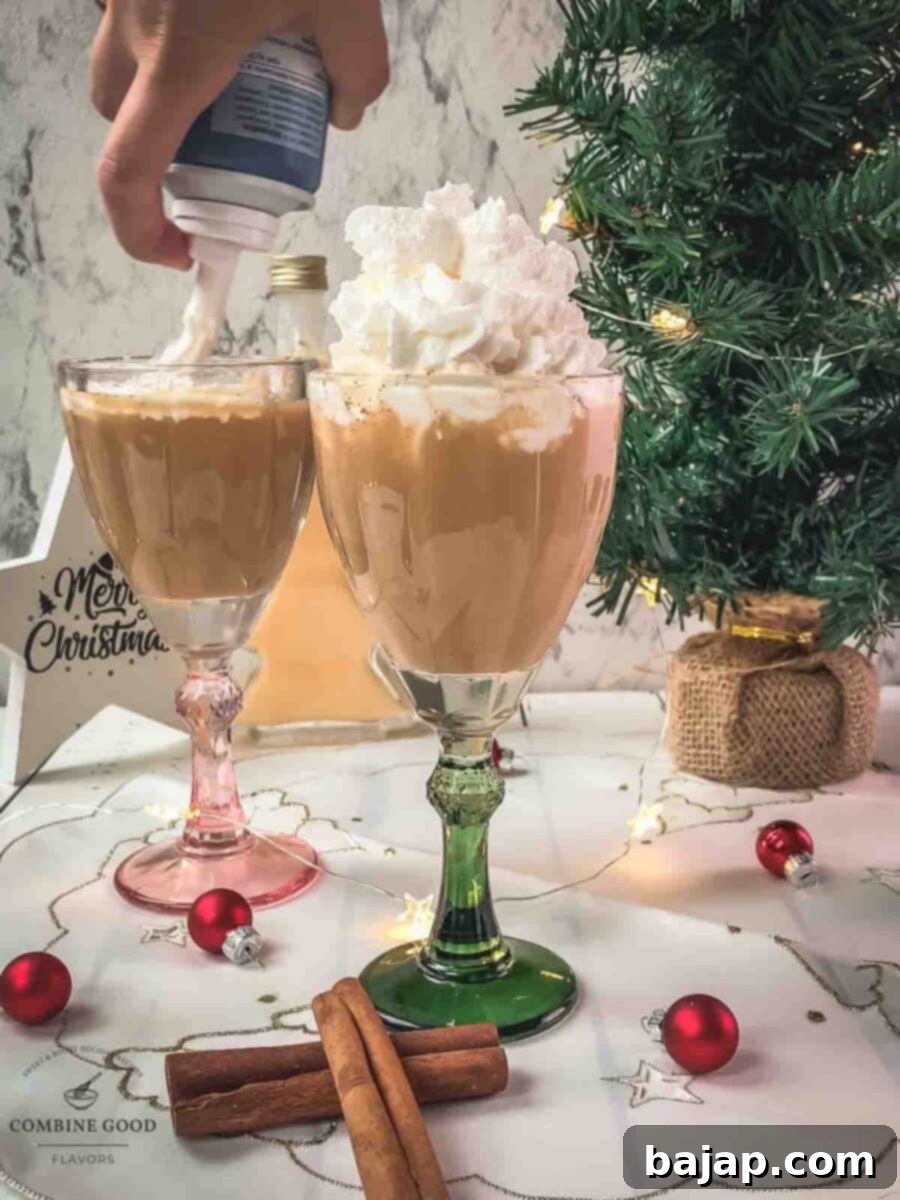 Top the spiced apple cider with whipped cream.