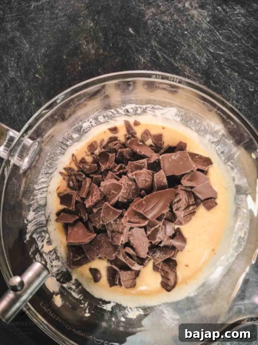 Add the roughly chopped St. Nicholas chocolate to the dough.