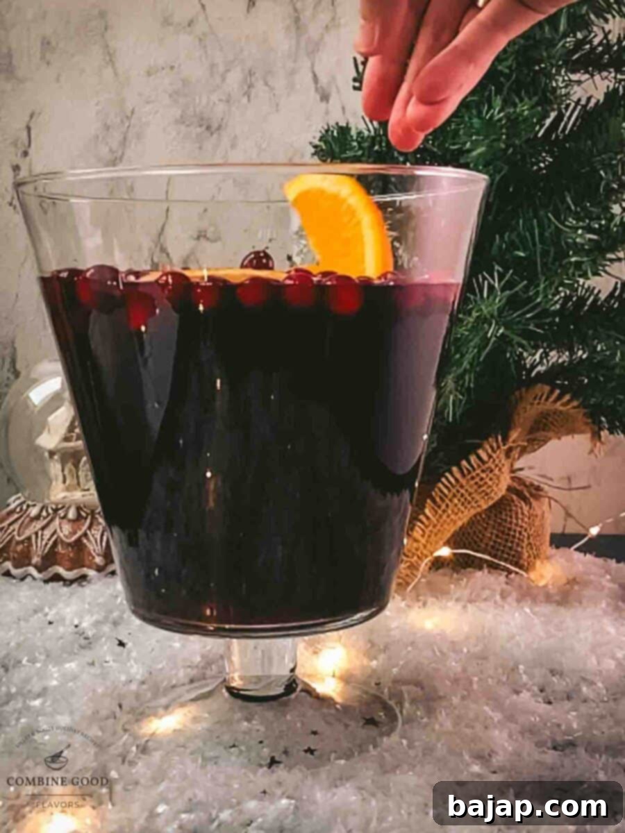 Add fresh orange slices to the pitcher for a flavorful winter sangria.