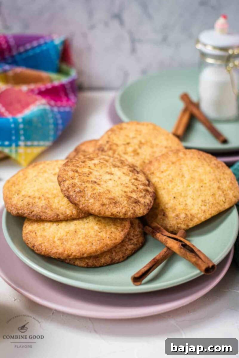 Fluffy snickerdoodle cookies placed on multicolored plates.