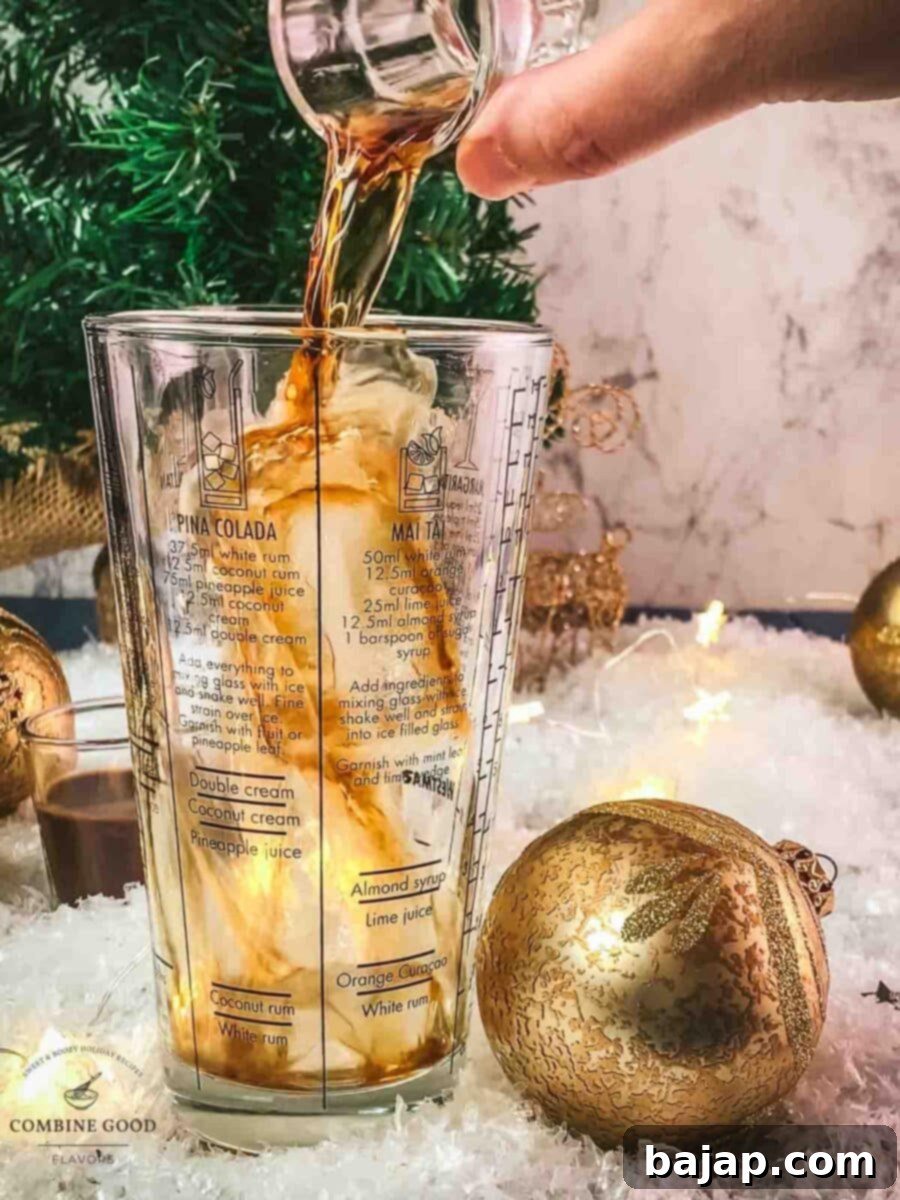 Pour spiced rum into the cocktail shaker.