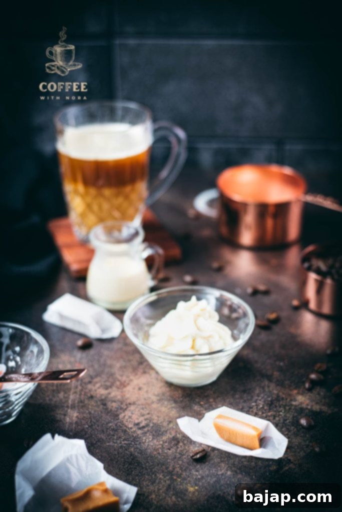 Whipped coffee creamer in small glass bowl.