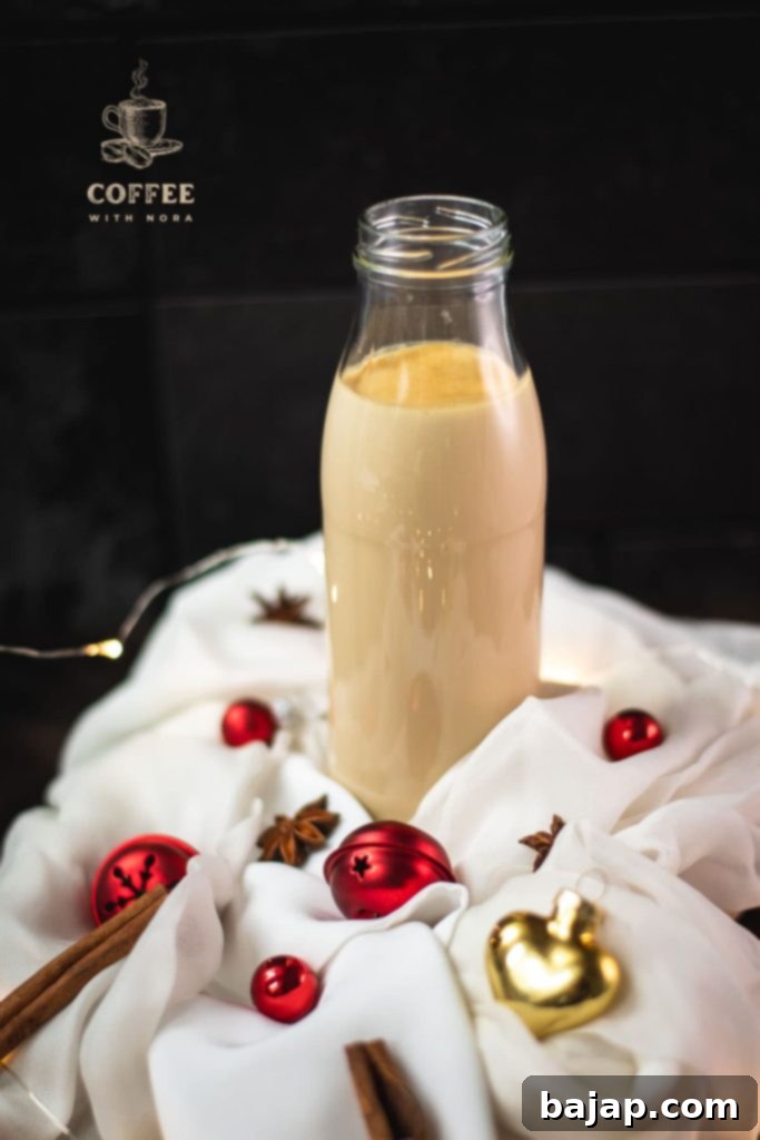 Festive Holiday Coffee Creamer 1 Homemade Christmas coffee creamer in a preserving bottle, ready to enjoy.