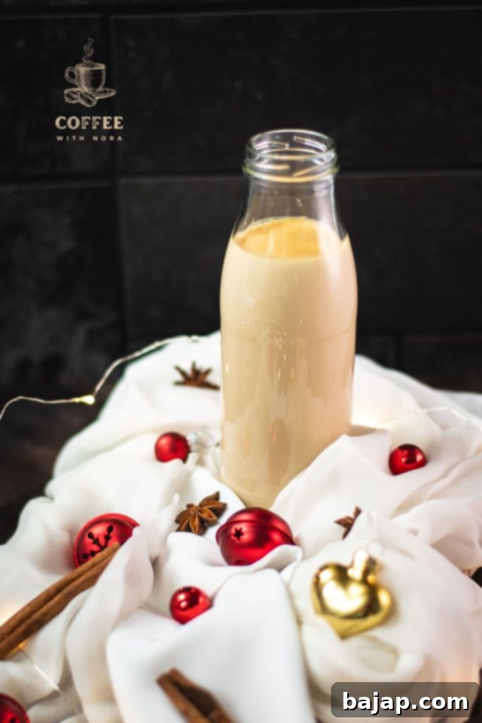 Festive Holiday Coffee Creamer 9 Delicious homemade Christmas creamer in a preserving bottle.
