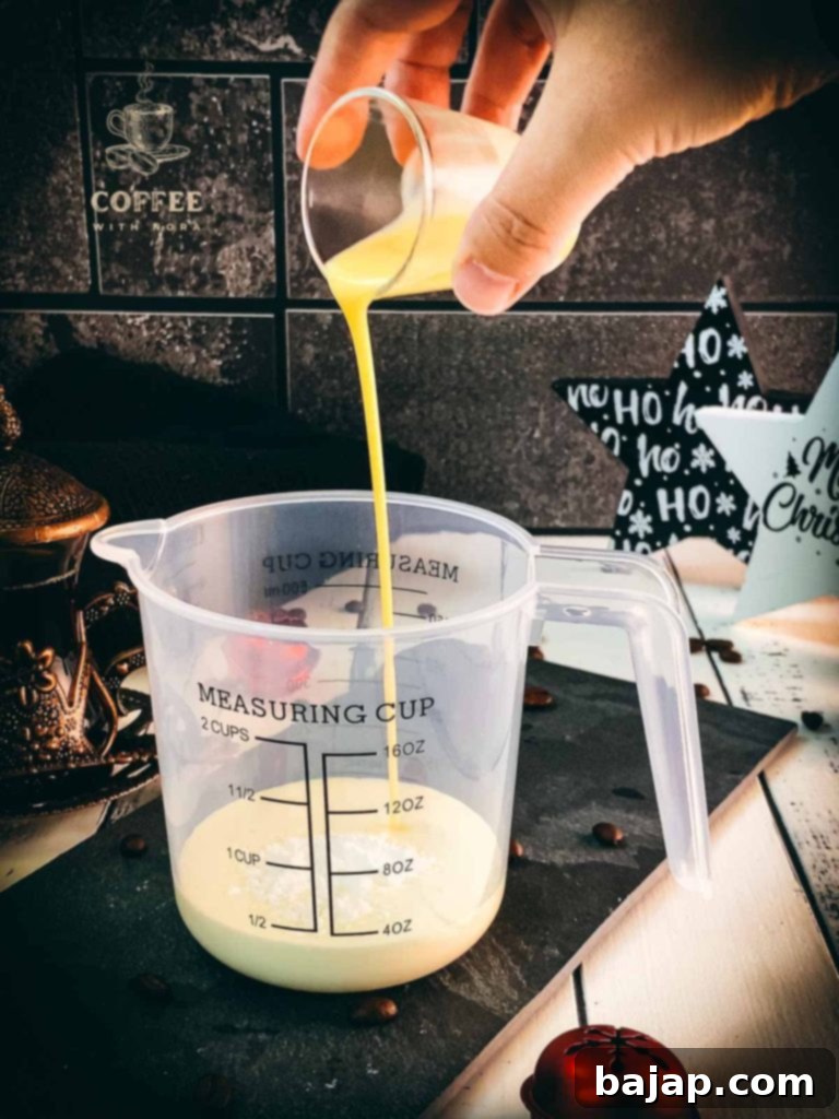 Festive Eggnog Cloud Cream 5 Add eggnog to mixing bowl