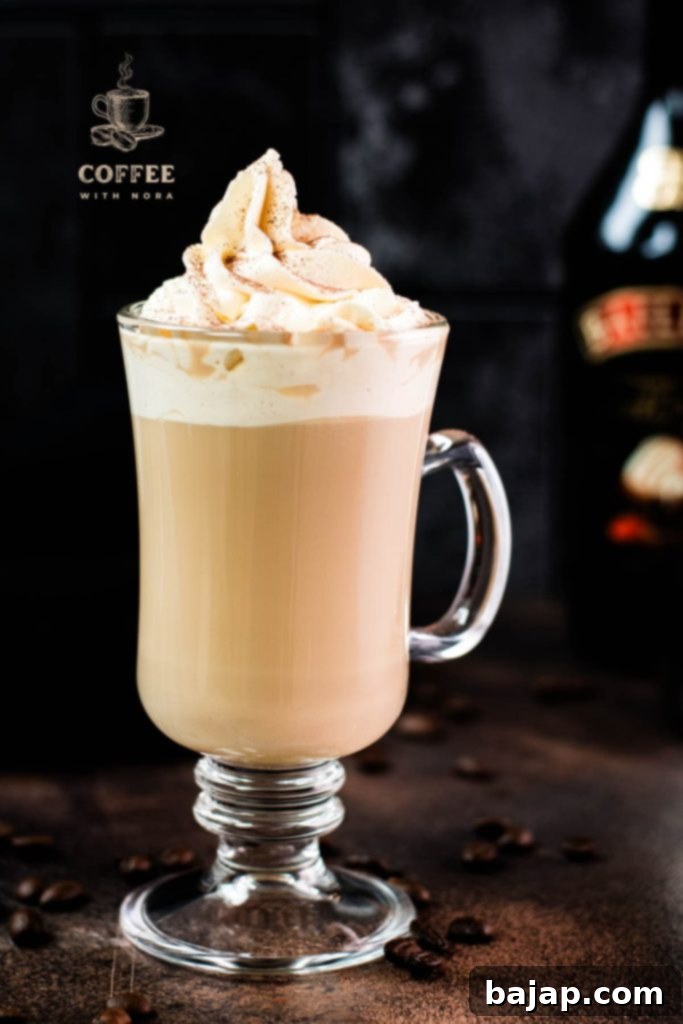 Elegantly Infused: A Baileys Coffee Creation 1 A perfectly made Baileys and coffee, topped with whipped cream and cocoa powder.