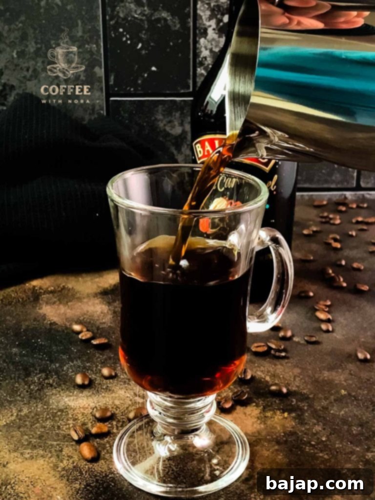 Elegantly Infused: A Baileys Coffee Creation 2 Pouring strong coffee into a serving glass.