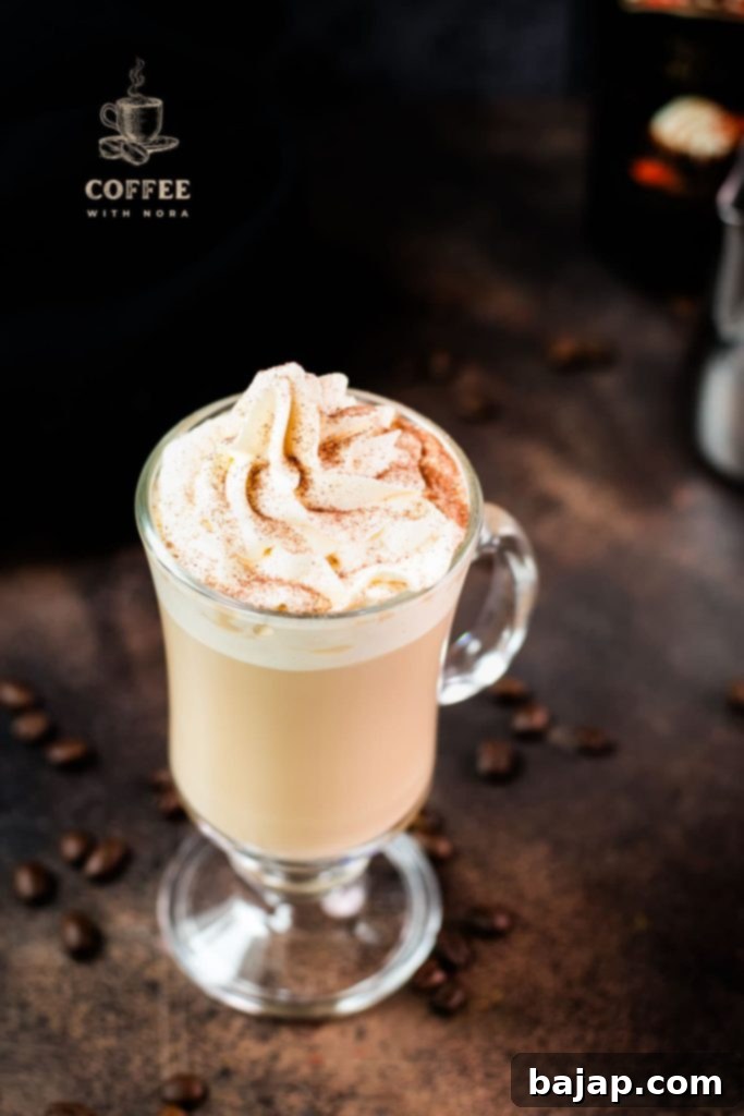 Elegantly Infused: A Baileys Coffee Creation 6 A delicious Baileys and coffee with whipped cream and cocoa powder.