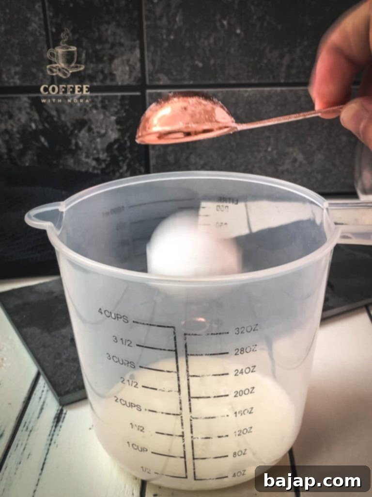 Iced Vanilla Cream Coffee: A Refreshing Homemade Brew 5 Add the powdered sugar to the mixing bowl.