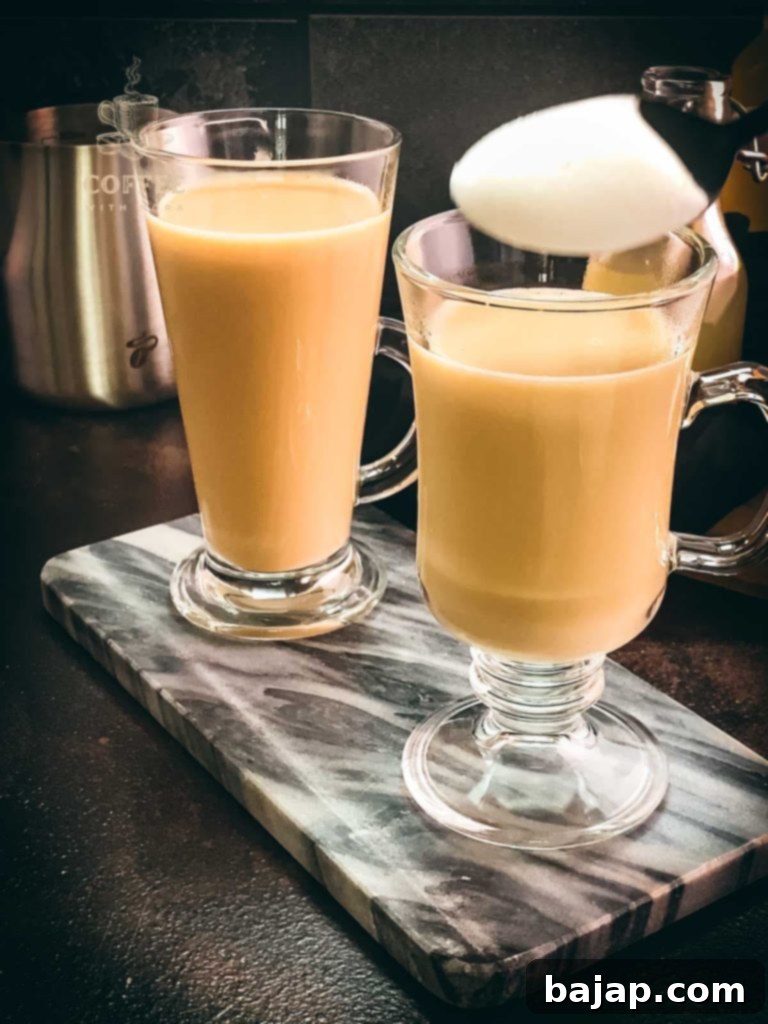 Ginger Coffee: A Zesty Brew for Immunity 6 Top your ginger coffee with frothed milk and dust with cinnamon.
